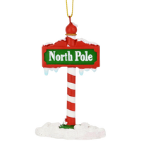 The North Pole Sign Covered in Snow Christmas Tree Ornaments