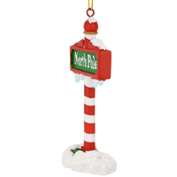 The North Pole Sign Covered in Snow Christmas Tree Ornaments