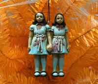 
              scary twins Halloween décor
            