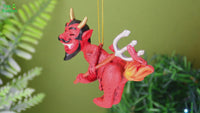 
              Devil's Cookout Funny Christmas Ornament with The Devil Cooking a Hot Dog
            